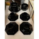 A VERY STYLISH FRENCH OCTAGONAL BLACK SET OF CUPS, SAUCERS, BOWL AND PLATES