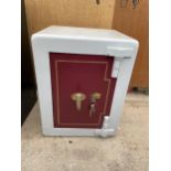 A REFURBISHED VINTAGE SAFE WITH BRASS HANDLE AND KEY