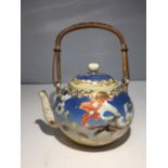 AN OLD ORIENTAL STYLE TEAPOT (SPOUT A/F)