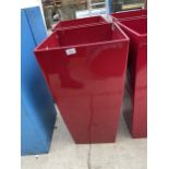 A PAIR OF RED FIBRE GLASS PLANTERS (H:75CM)