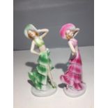 A PAIR OF ART DECO STYLE LADIES (ONE A/F CHIP TO HAT)