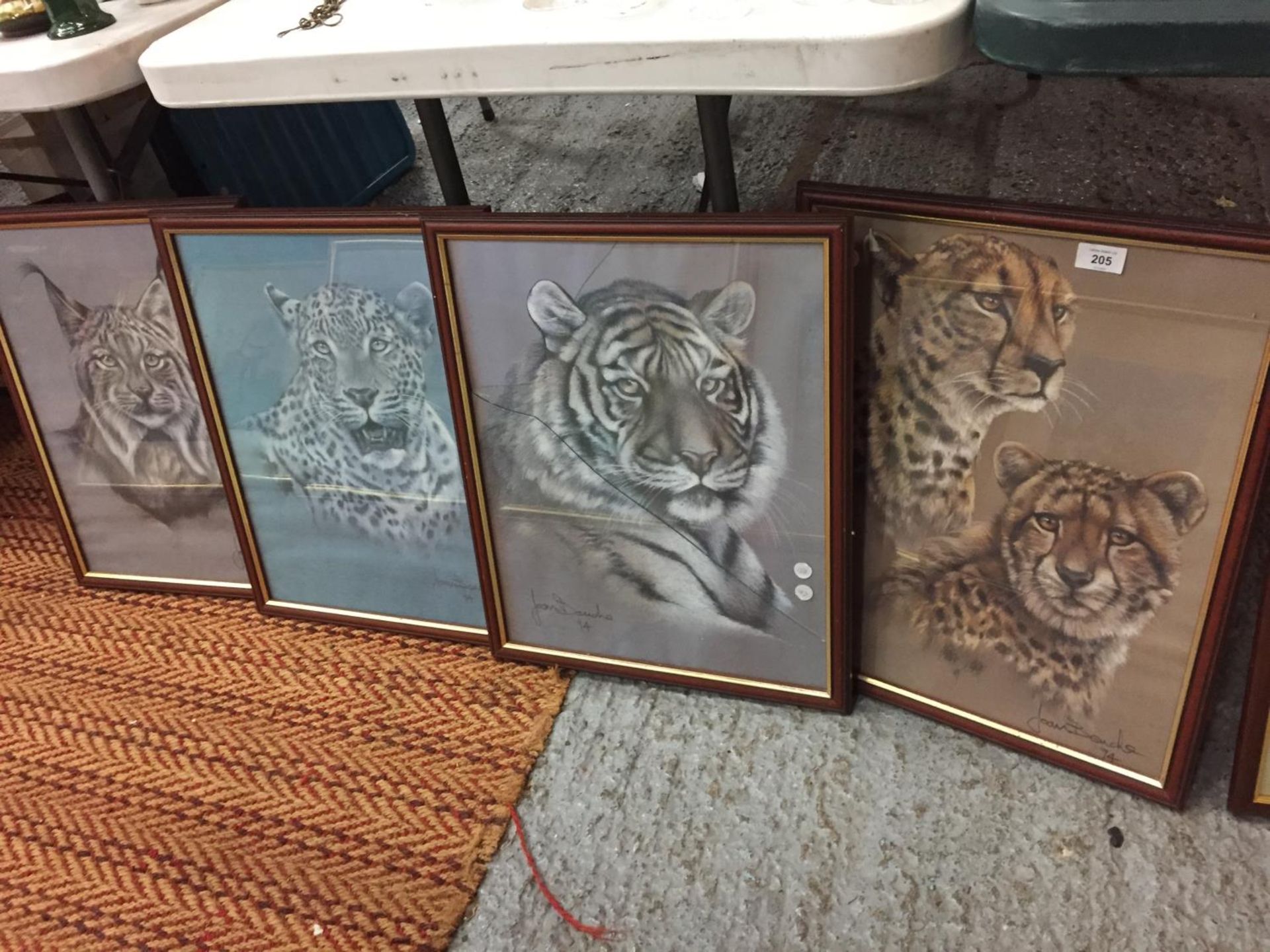 FOUR FRAMED PRINTS OF BIG CATS TO INCLUDE A CHEETAH, JAGUAR, TIGER AND LYNX SIGNED JOAN BENCHE