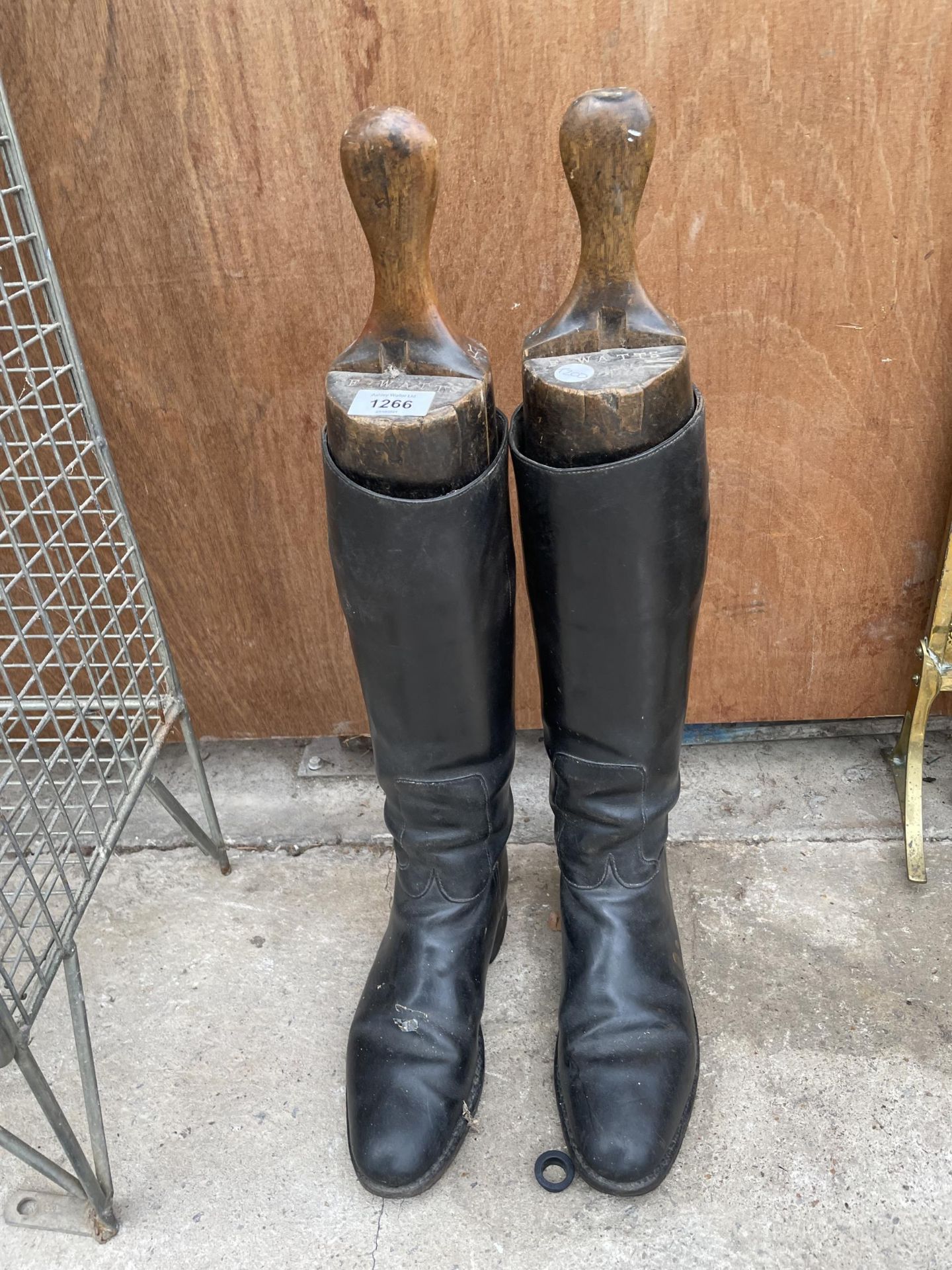 A PAIR OF LEATHER RIDING BOOTS WITH FOUR SECTION WOODEN STRETCHERS STAMPED 'F. WATTS'