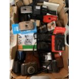 A LARGE QUANTITY OF CAMERAS TO INCLUDE FUJIFILM A343, PRAKTICA, HALINA PLUS CASES