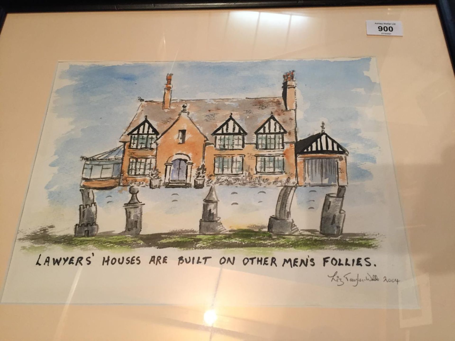 A SIGNED FRAMED PICTURE BY LIZ TAYLOR WEBB 2004, OF A HOUSE SAYING LAWYERS' HOUSES ARE BUILT ON - Image 2 of 2