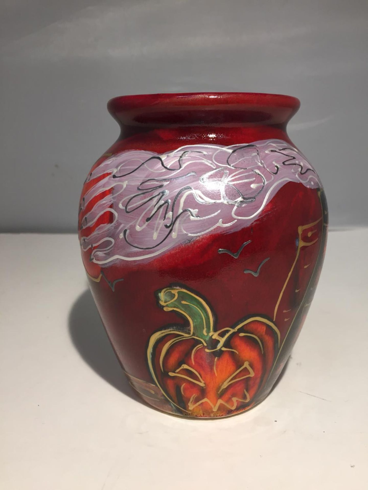 AN ANITA HARRIS HANDPAINTED AND SIGNED PUMPKIN VASE