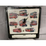 A SLATE WALL CLOCK WITH PICTURES OF VINTAGE BUSES