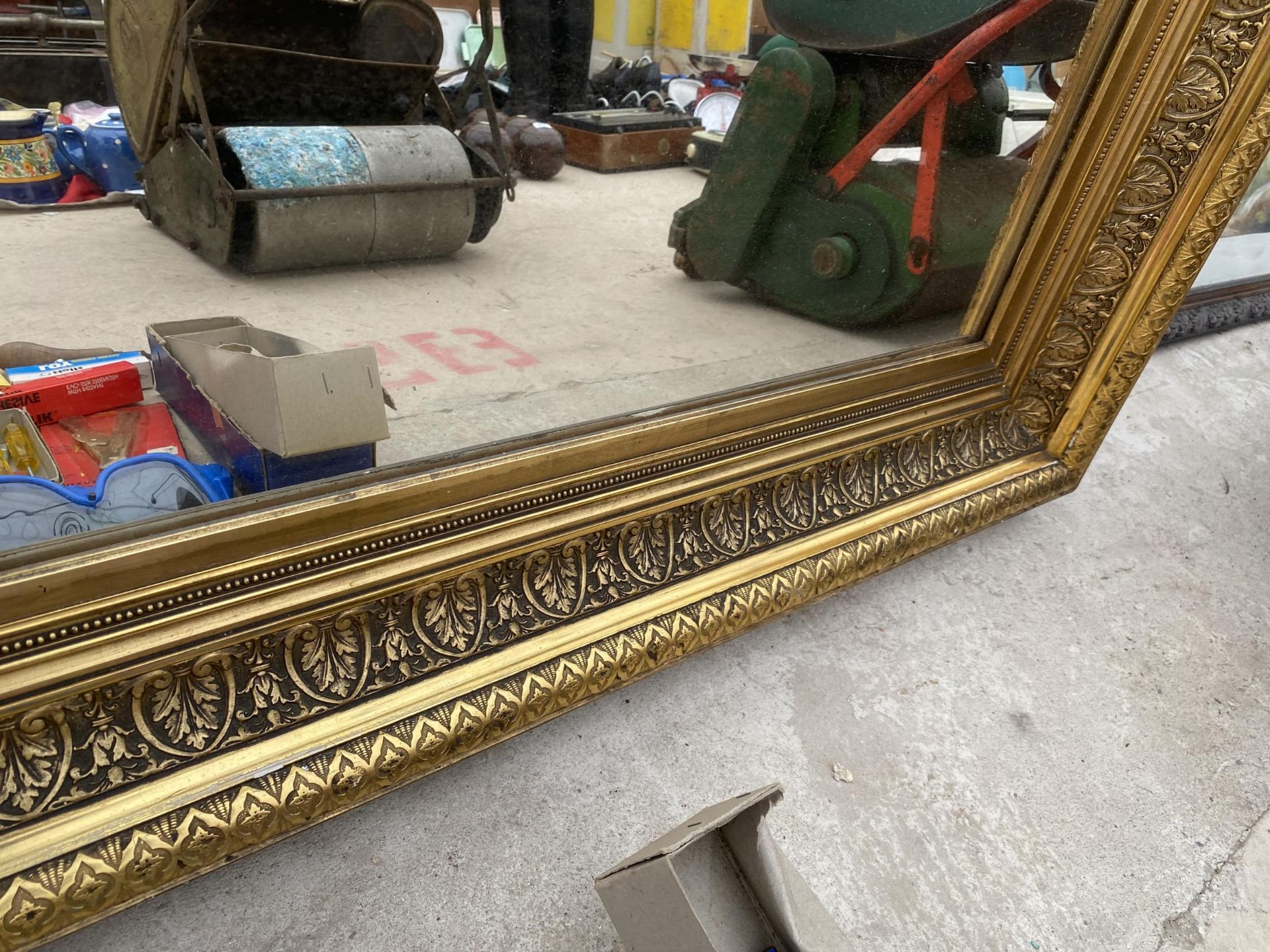 A 19TH CENTURY STYLE GILT FRAMED WALL MIRROR BEARING THE LABEL TO THE BACK 'IN INVENTORY FROM - Image 3 of 3