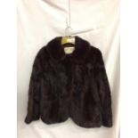 A FUR JACKET BY BROWNS OF CHESTER