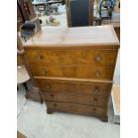 A LEBUS WALNUT CHEST OF FIVE DRAWERS - 33" WIDE