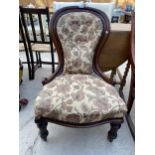 A VICTORIAN BUTTON BACK SPOON BACK CHAIR WITH FLORAL UPHOLSTERY