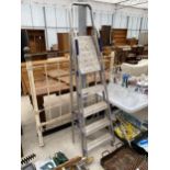 A FOUR RUNG ALLUMINIUM STEP LADDER