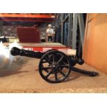 A HEAVY CAST IRON CANNON LENGTH 34CM