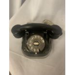 A VINTAGE BLACK TELEPHONE WIRED FOR MODERN USE