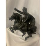 A SPELTER FIGURINE OF KING AND HORSE A/F