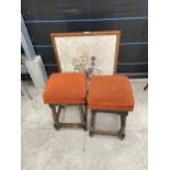 AN OAK FOLDING TABLE/FIRESCREEN WITH WOOLWORK DEPICTING FLOWERS AND TWO STOOLS