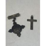 A MARKED SILVER CROSS AND A HALLMARKED ST JOHNS AMBULANCE MEDAL