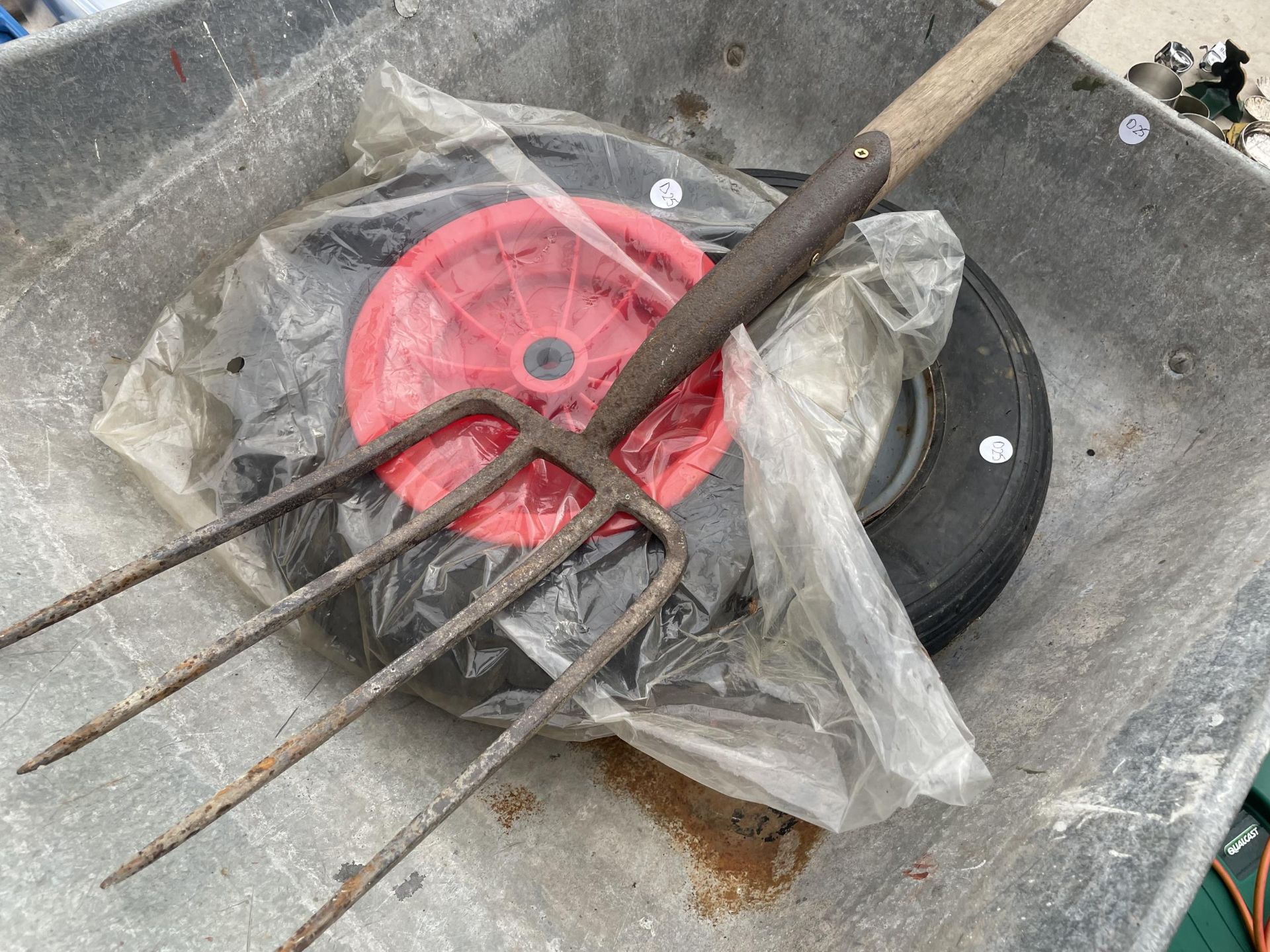 A WHEEL BARROW WITH TWO SPARE WHEELS AND A GARDEN FORK - Image 2 of 2