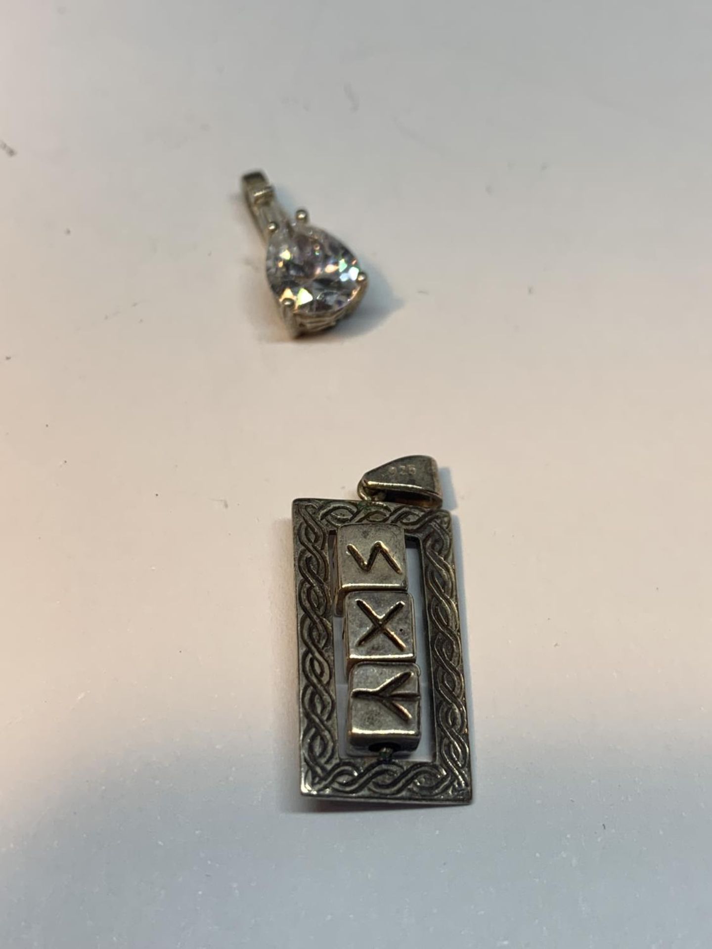 SIX SILVER PENDANTS TO INCLUDE A PINK STONE, MALTESE CROSS, EWER, CLEAR STONE ETC - Image 3 of 4