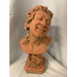 A TERRACOTTA STONE BUST OF PAN, HEIGHT APPROX 47CM