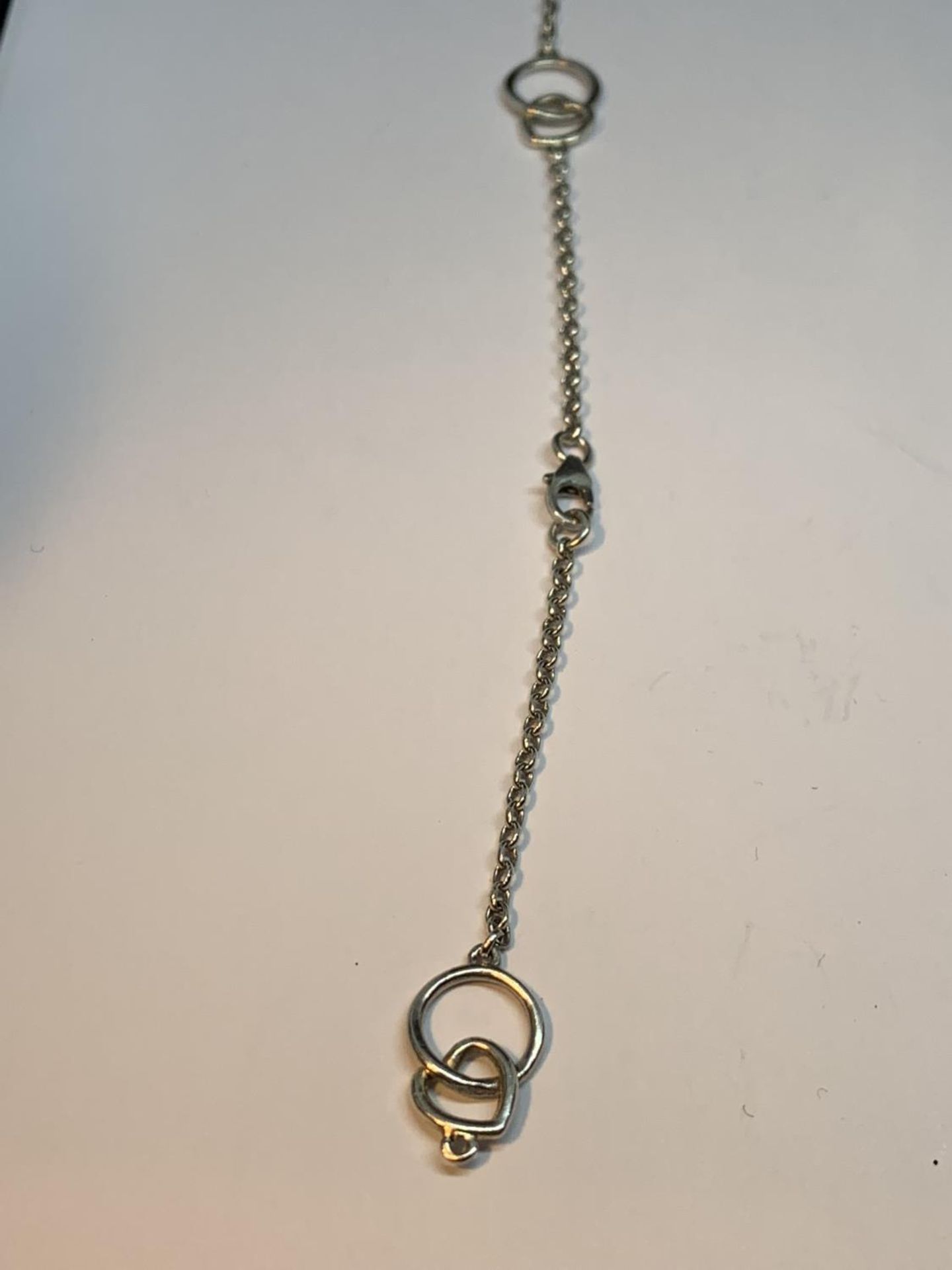 FOUR SILVER BRACLETS TO INCLUDE A DOLPHIN DESIGN - Image 4 of 5