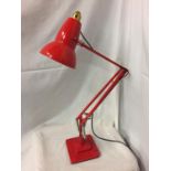 A RED ANGLE POISE LAMP