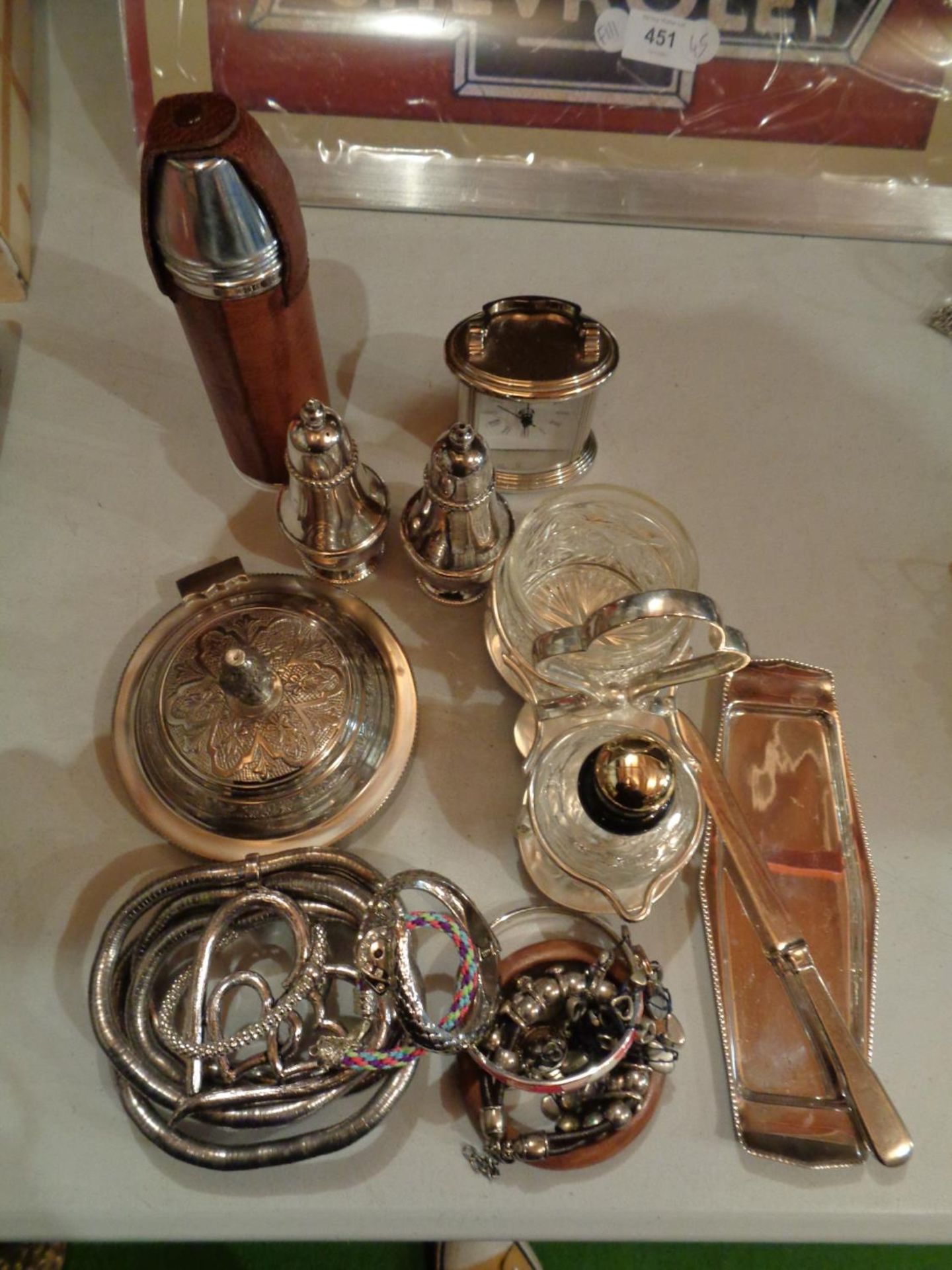 A NUMBER OF SILVER PLATED ITEMS TO INCLUDE A SALT AND PEPPER SHAKER AND ALSO SOME COSTUME JEWELLERY