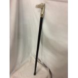 A WALKING CANE WITH A SILVER COLOURED HORSES HEAD TOP