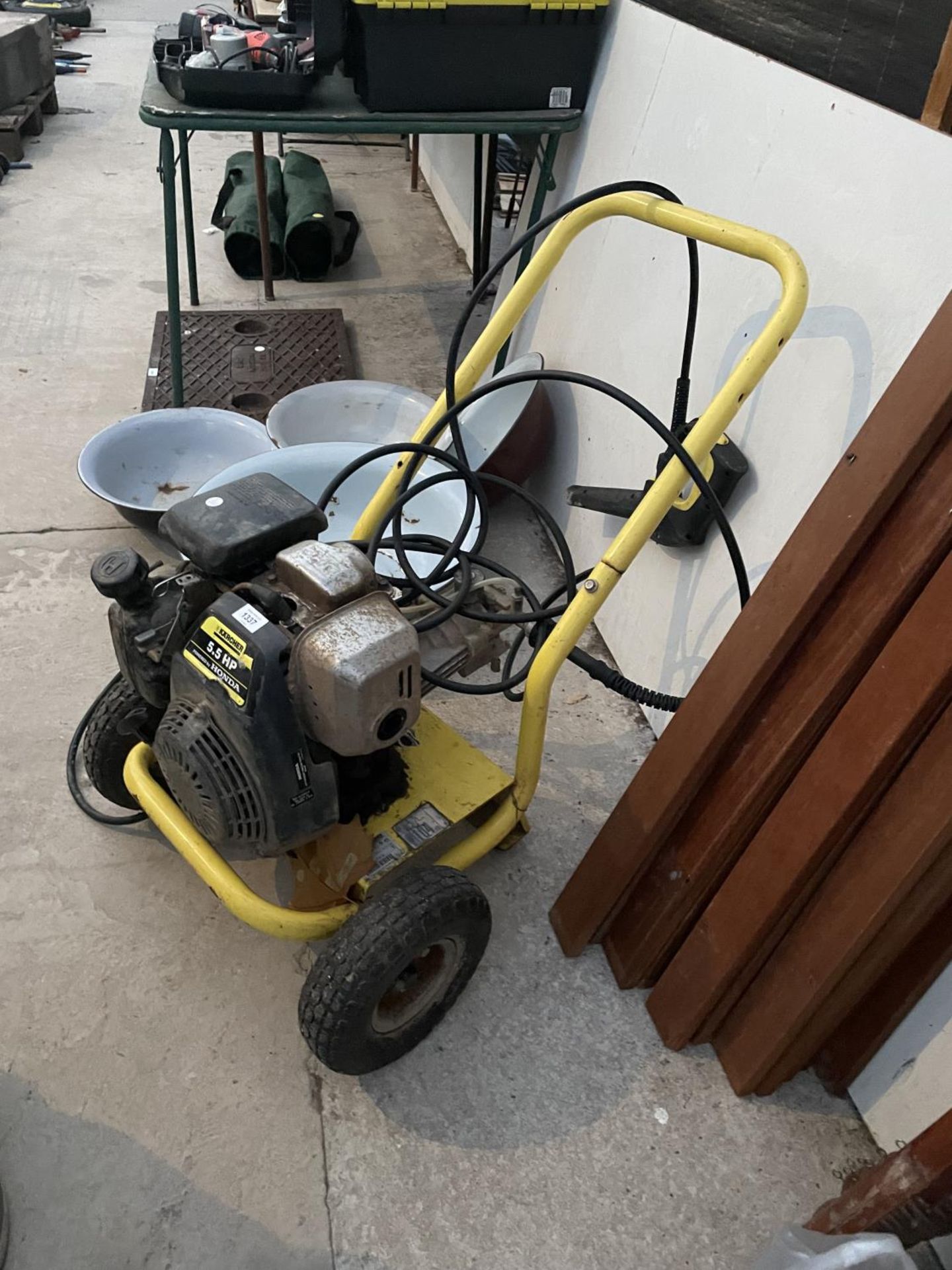 A KARCHER 5.5 HP PRESSURE WASHER WITH HONDA ENGINE