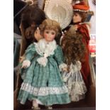 FIVE DOLLS TO INCLUDE FOUR PORCELAIN DOLLS OF WHICH ONE IS STAMPED WITH A MAKERS MARK OF ALBERON