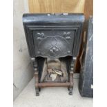 A VINTAGE CAST IRON FIRE PLACE WITH DECORATIVE SURROUND