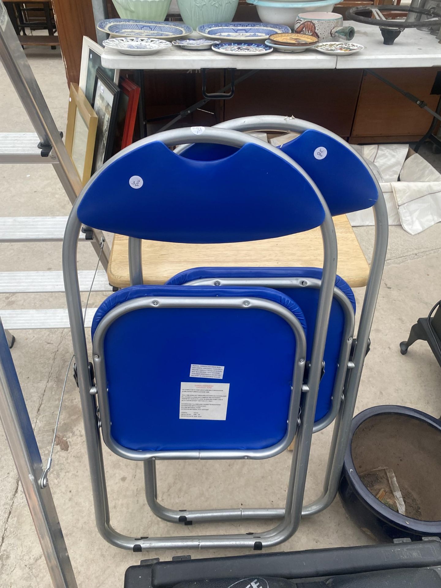 A WOODEN FOLDING TABLE AND TWO METAL FRAMED FOLDING CHAIRS - Image 2 of 4