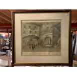 A MOUNTED AND FRAMED PICTURE OF A VILLAGE SCENE