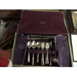 A FORTY EIGHT PIECE CANTEEN OF TARNPRUFE CUTLERY IN A CASE