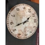 A GLASS FRONTED GLOBE/MAP STYLE WALL CLOCK