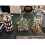 TWO GLASS DOMED DISPLAYS OF A LARGE AMOUNT OF THIMBLES AND ANOTHER GLASS DISPLAY CASE OF THIMBLES