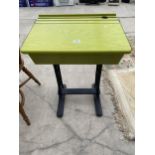 A MID 20TH CENTURY SINGLE CHILDS DESK ON CAST IRON FRAME, 22.5" WIDE