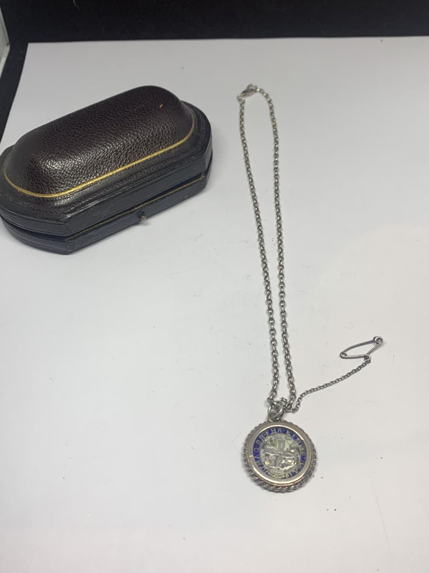 A SILVER GEORGE III FOUR PENCE IN A MOUNT ON A CHAIN WITH A PRESENTATION BOX