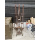 THREE DECORATIVE WROUGHT IRON THREE TIER PLANT STANDS