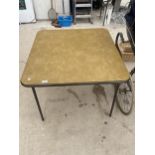 A SQUARE FOLDING TABLE