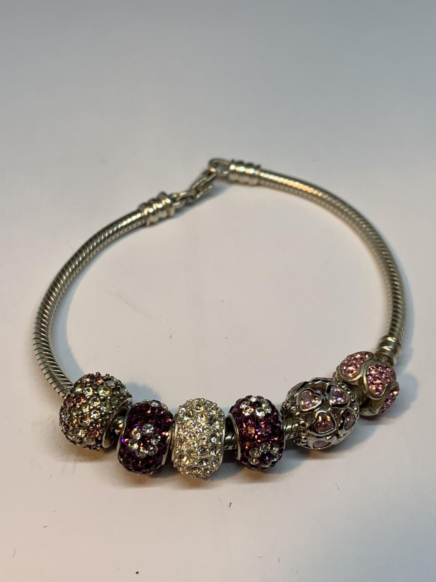 A SILVER PANDORA STYLE BRACELET WITH SIX CHARMS AND A PAIR OF CHARM EARRINGS - Image 3 of 3