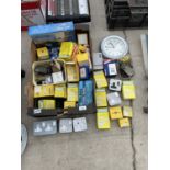 AN ASSORTMENT OF ELECTRICIANS ITEMS TO INCLUDE PLUG SOCKETS, WIRE CLIPS ETC