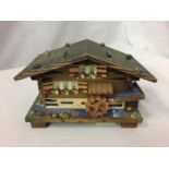 A VINTAGE CUENDET 15303 EDELWEISS SWISS HOUSE MUSICAL BOX