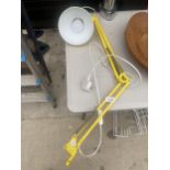 A RETRO YELLOW ANGLE POISE LAMP