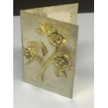 A HALLMARKED LONDON SILVER GREETINGS CARD WITH GILDED SILVER ROSES