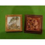 TWO FRAMED TILES, ONE FLORAL AND THE OTHER OF A PALACE AND PALM TREES