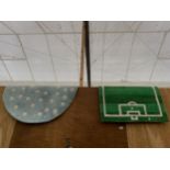 A MODERN POLKA DOT RUG AND A FOOTBALL PITCH RUG