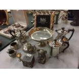A QUANTITY OF SILVER PLATED ITEMS TO INCLUDE TEAPOTS, JUGS, MONEY BOXES ETC