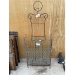 A DECORATIVE WROUGHT IRON FIRE SCREEN AND A FURTHER WROUGHT IRON MANEQUIN