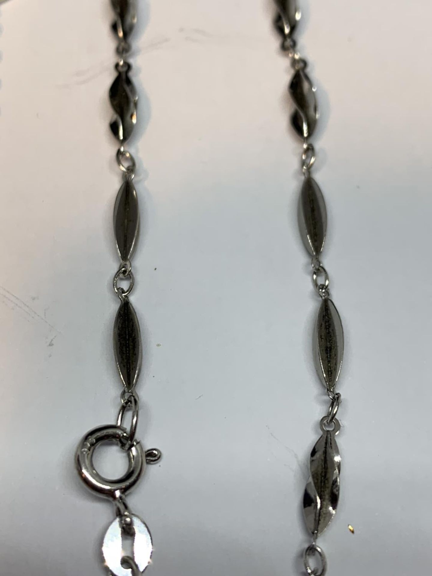 FOUR SILVER BRACLETS TO INCLUDE A DOLPHIN DESIGN - Image 3 of 5